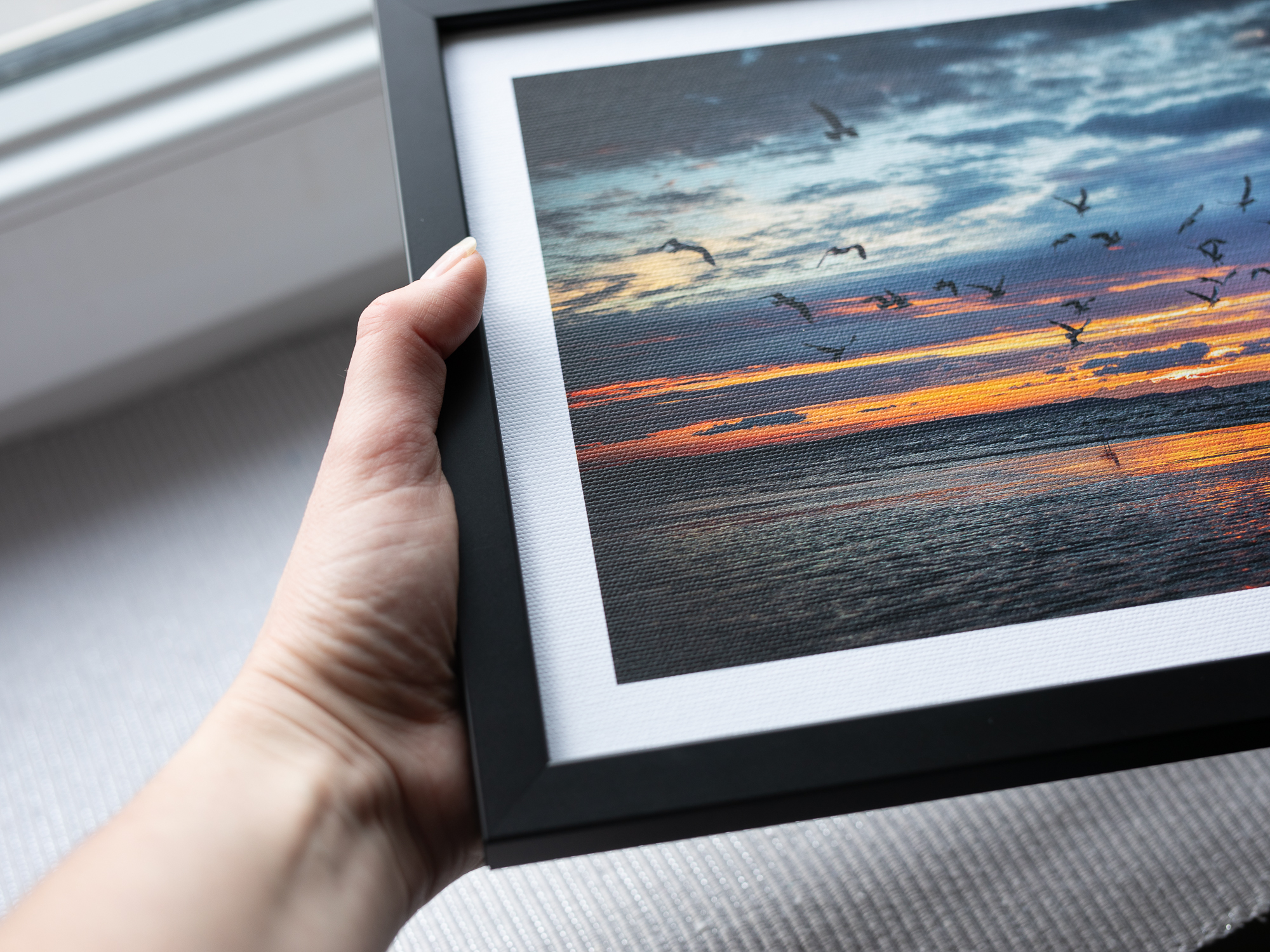 Quality framed wall art, home, office or public spaces wall decors - product photo in hand